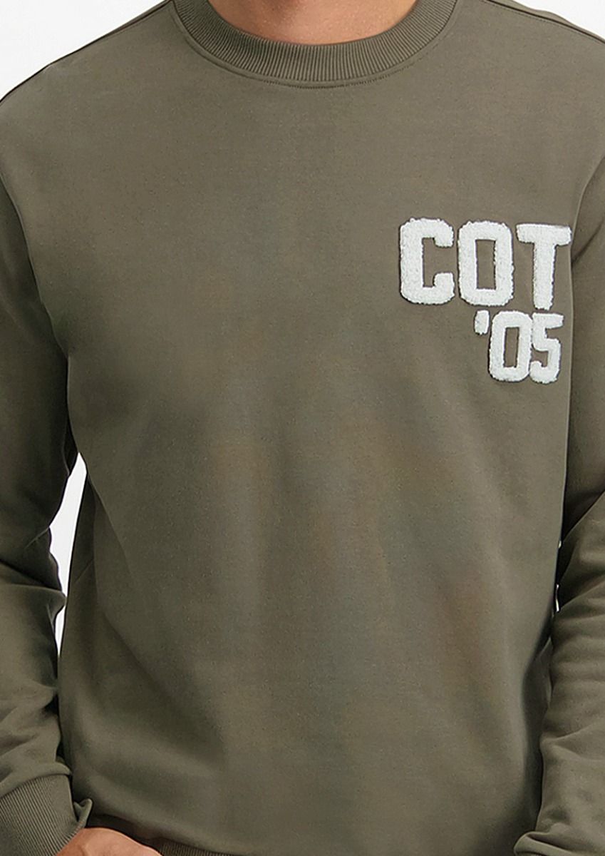 Benny donkergroene heren sweater met badstof logo Circle Of Trust official webshop